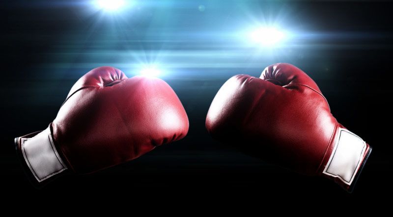 On-Premise vs. Cloud Computing - Red boxing gloves