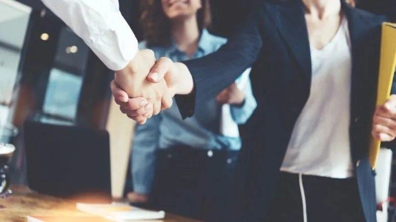 Business people shaking hands in the office