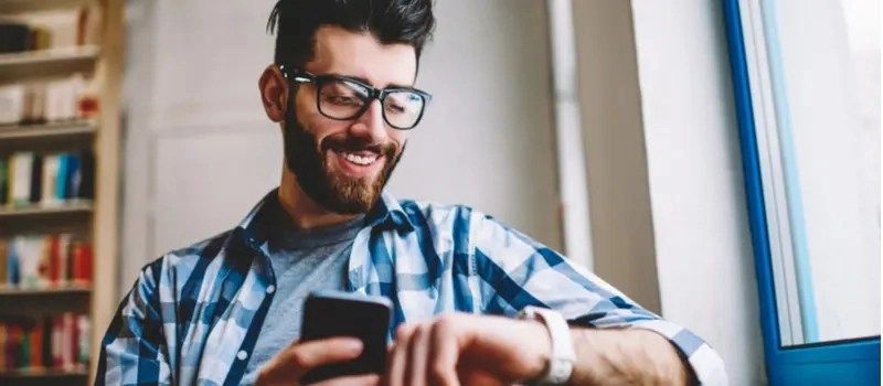 smiling successful hipster