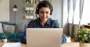 Call center agent works from home and stays with employer due to efficient software. 
