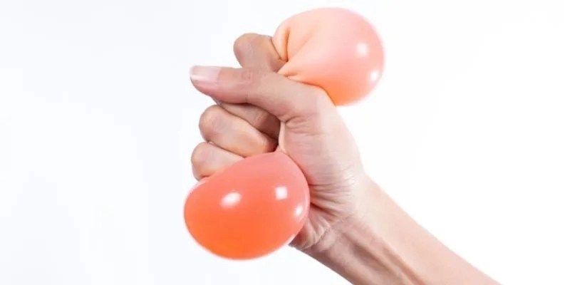 hand holding stress ball