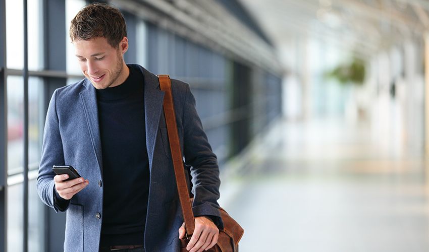 young-businessman-using-smart-phone