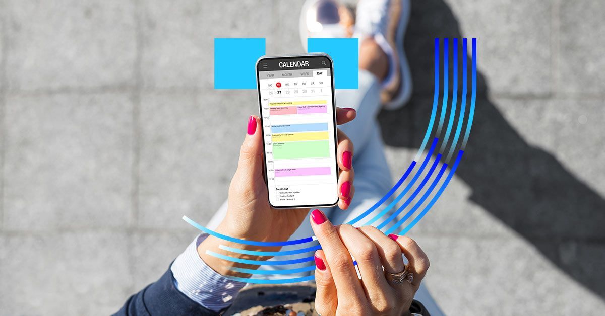 Top view of a mobile phone on a woman's hand