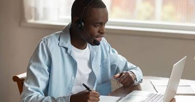 Contact center agent works on his total number of interactions, a primary measure of contact center activity.