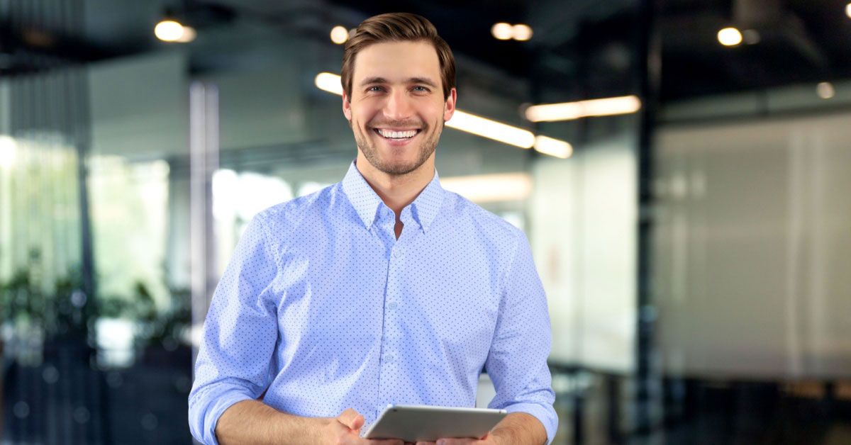 Business man happy with NiCE Interaction Analytics product