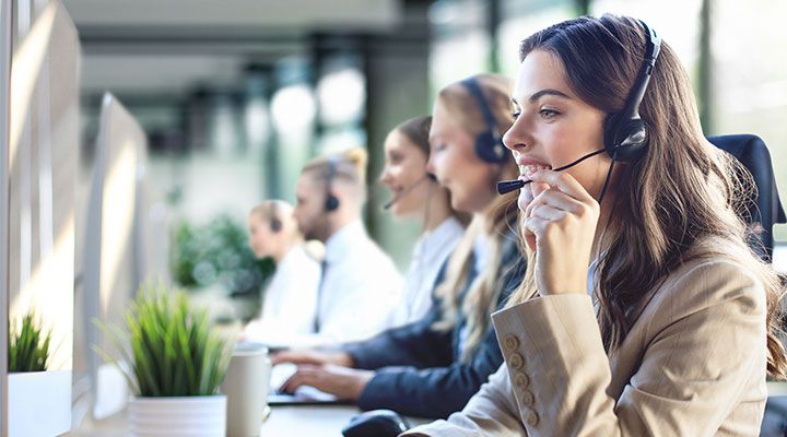 Call center agent talking to client