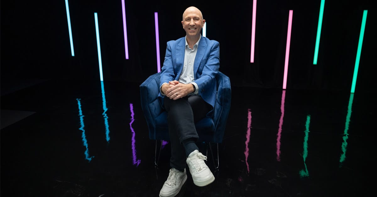 NiCE CEO Scott Russell shares the vision behind creating a NiCE world, where AI and human intelligence come together to deliver exceptional service